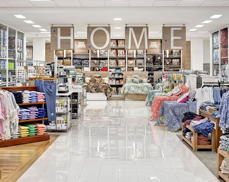 The Home area at Belk features a hanging "Home" sign