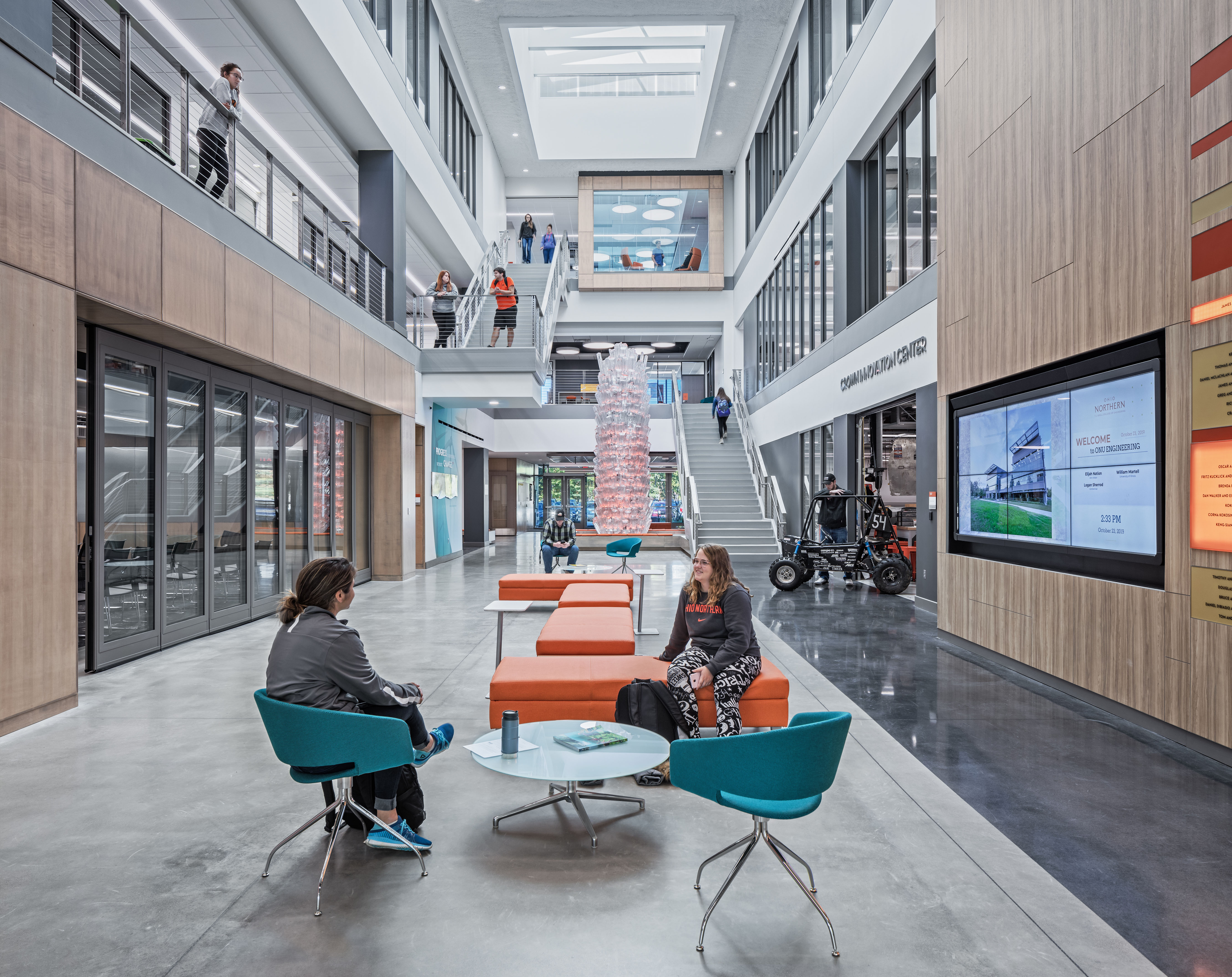 Students collaborate inside the atrium 