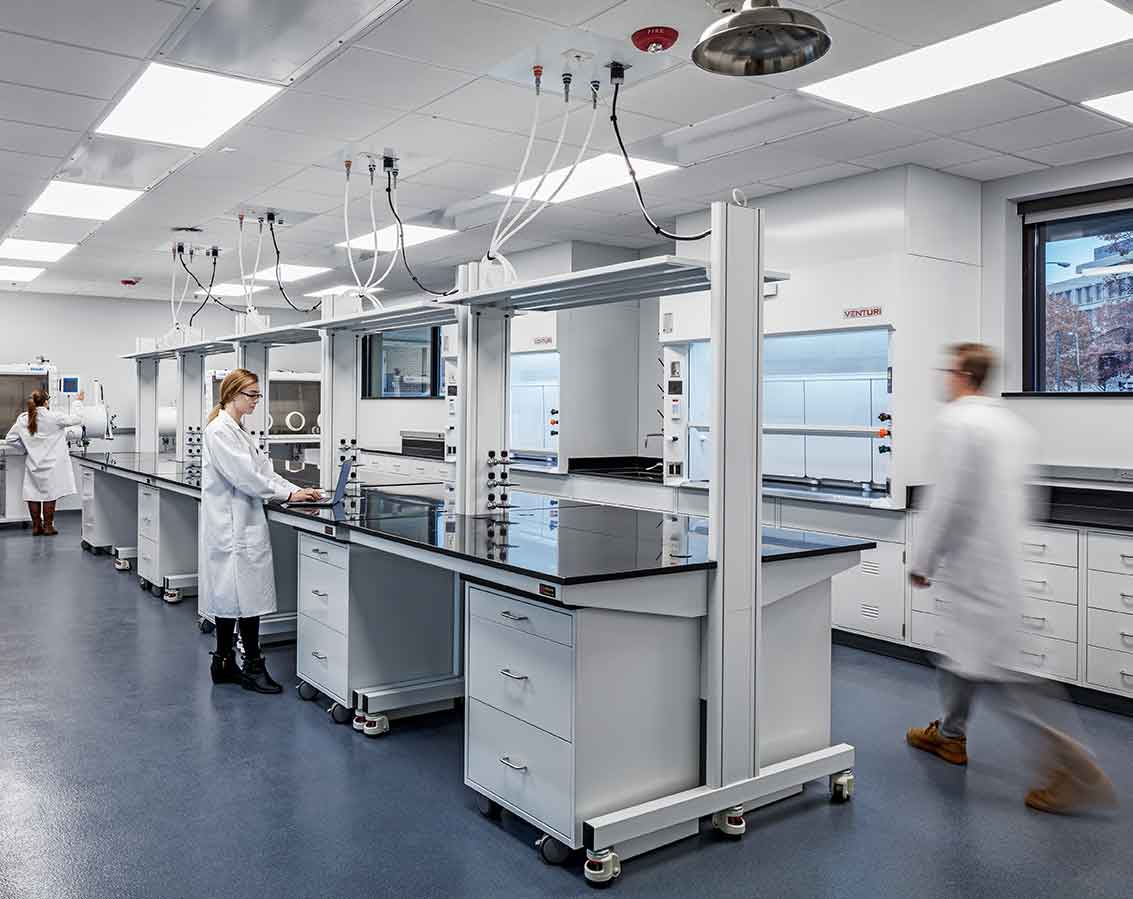 Students work inside a lab together