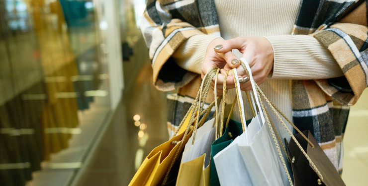 Woman Holding Shopping Bags