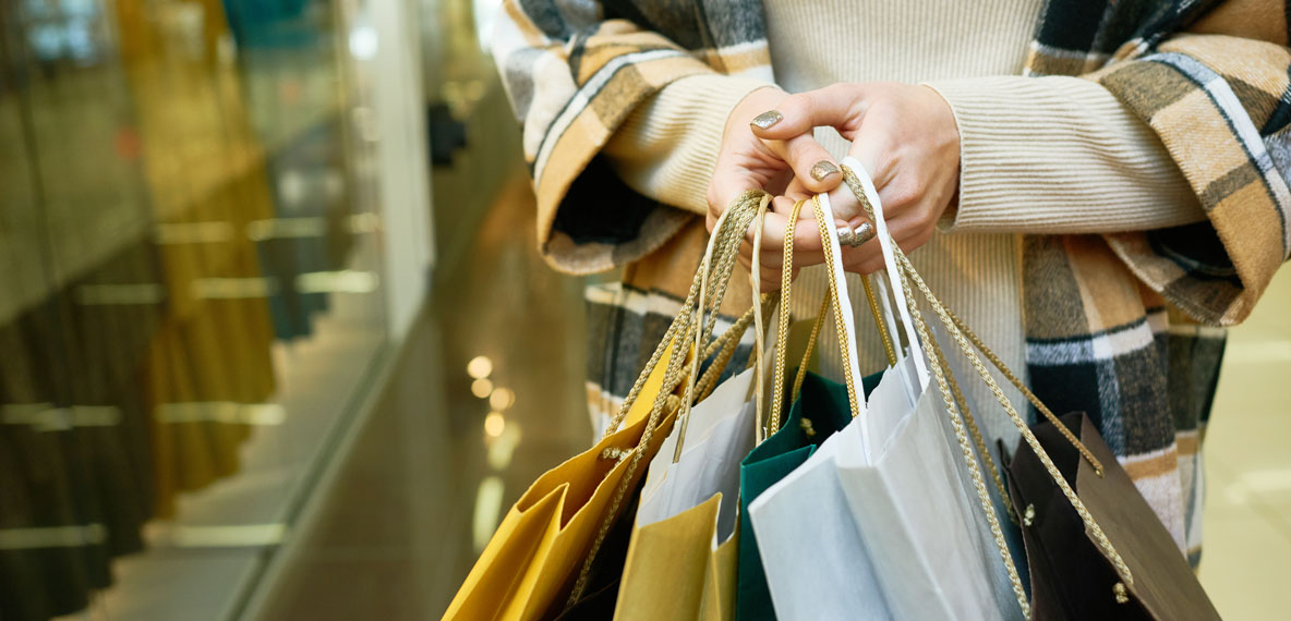 Woman Holding Shopping Bags