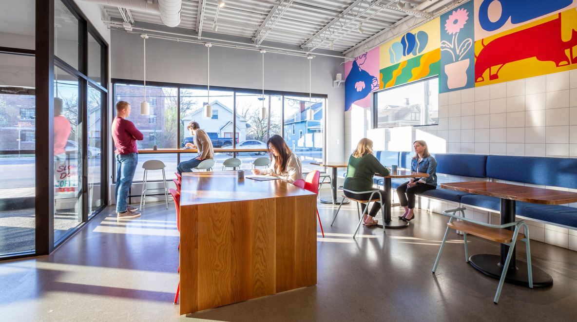 Image of sunlit seating area inside of Proud Hound