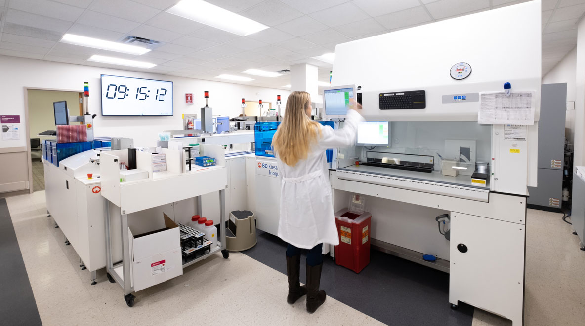 Scientist working in lab at UC Health