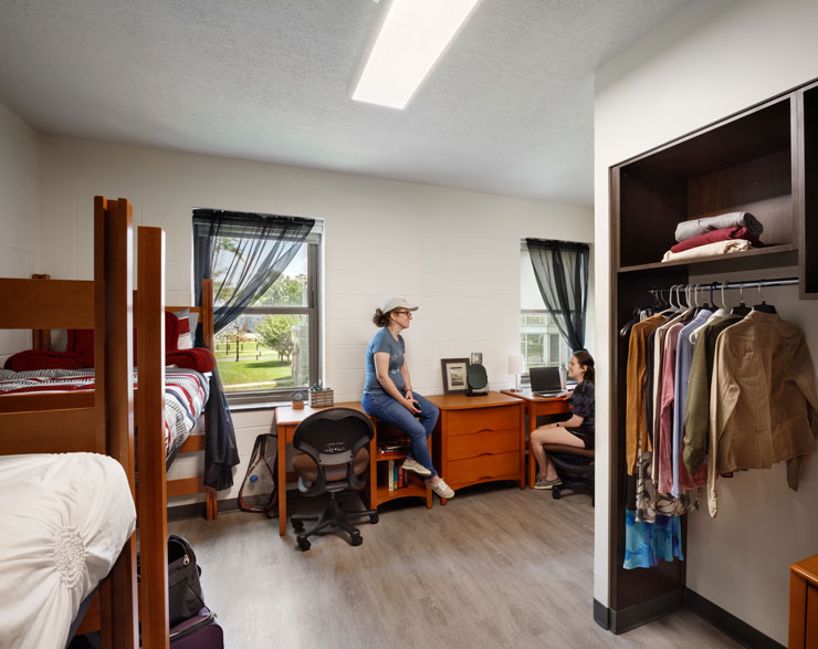 Students socializing in a student suite in Miller Hall at Heidelberg University