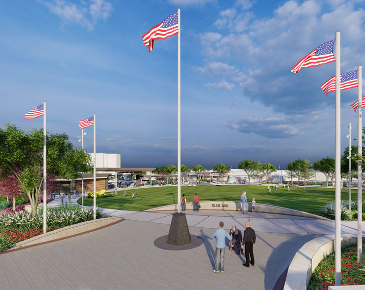 People admiring the flags along the Bicentennial Veteran's Memorial at Blue Ash's new Towne Square