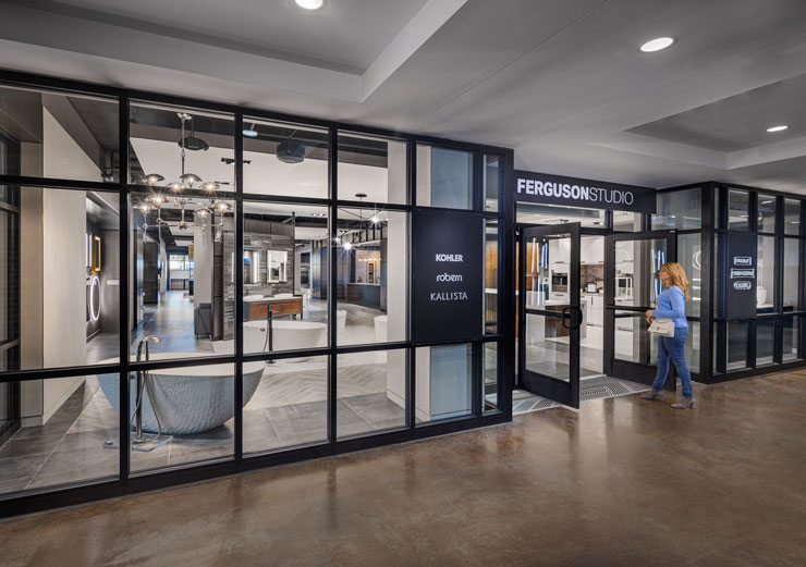 Woman entering the Ferguson Studio Showroom