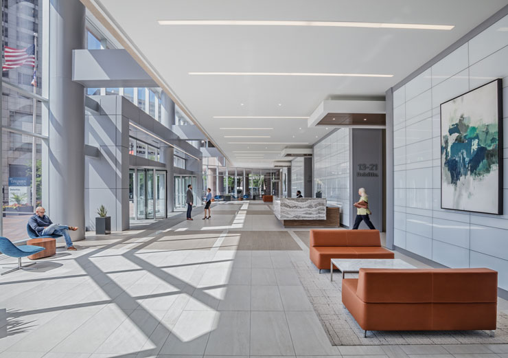 People standing in lobby of Columbia Plaza