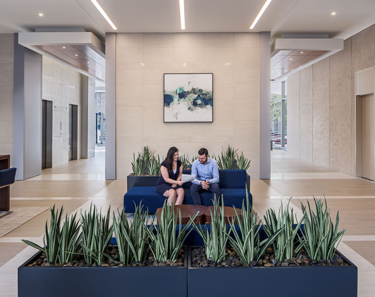 People meeting in the Columbia Plaza lobby