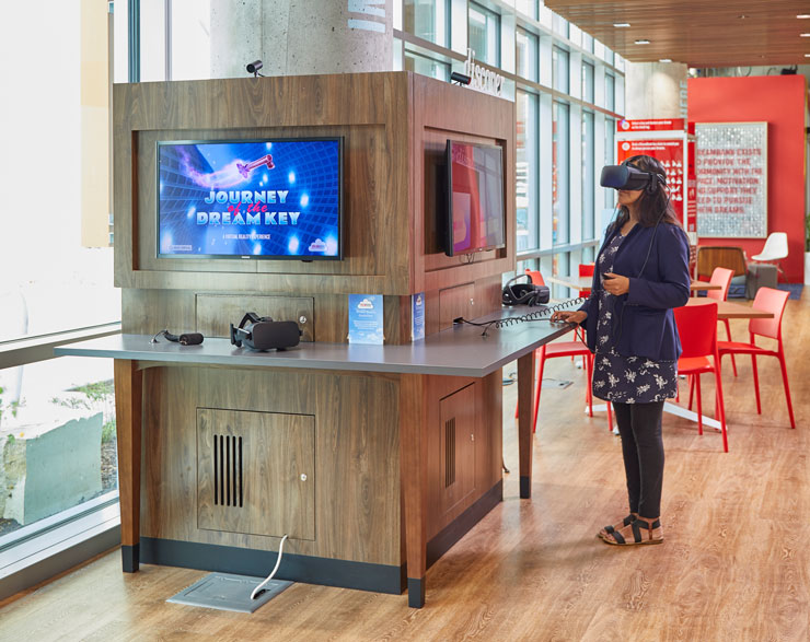 A person using virtual reality at the DreamBank in American Family Insurance 