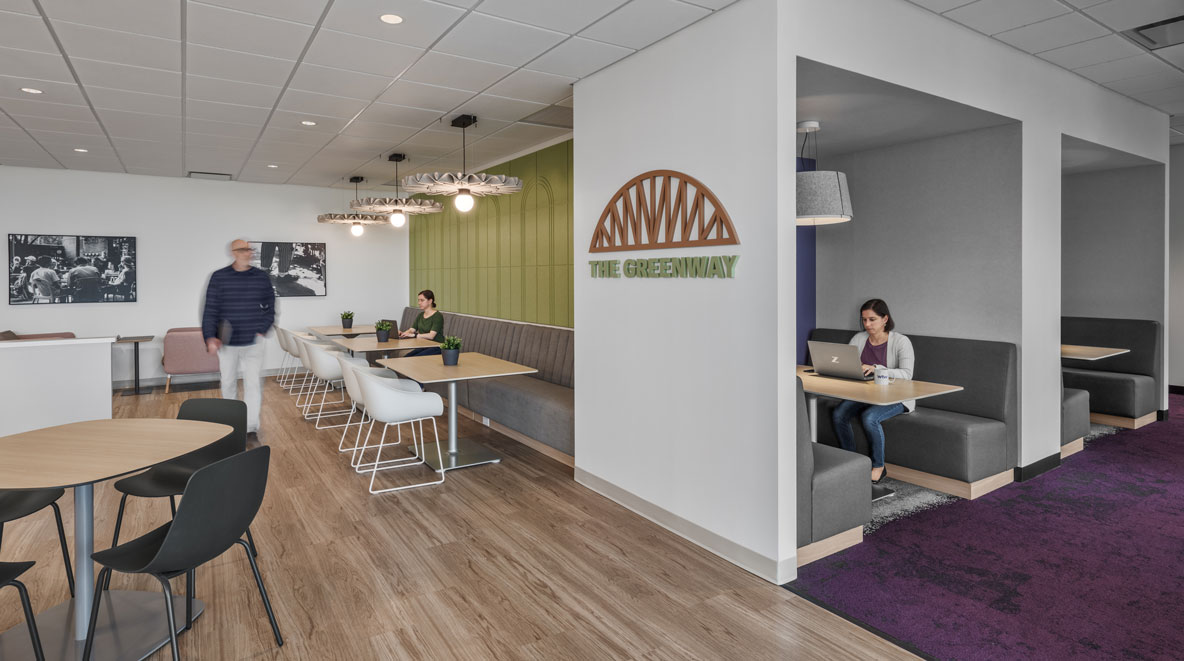 The Greenway Cafe and work nooks within WTW's Charlotte office