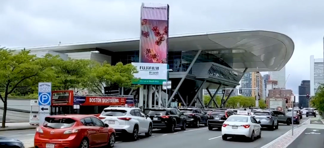 Exterior of the BIO International Conference with a Fujifilm advertisement  