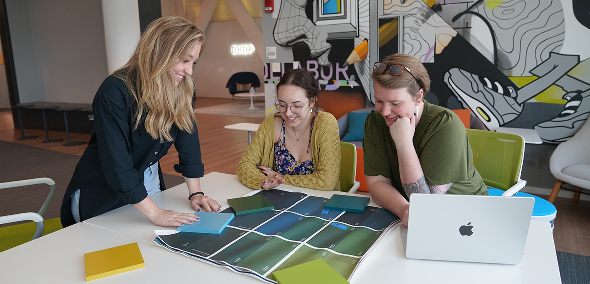 Intern Kathryn Lutmer learns color theory with her mentors.