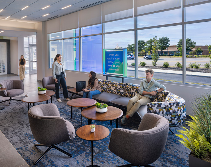 People using the comfortable seating option within Fifth Third Bank in Milford, OH