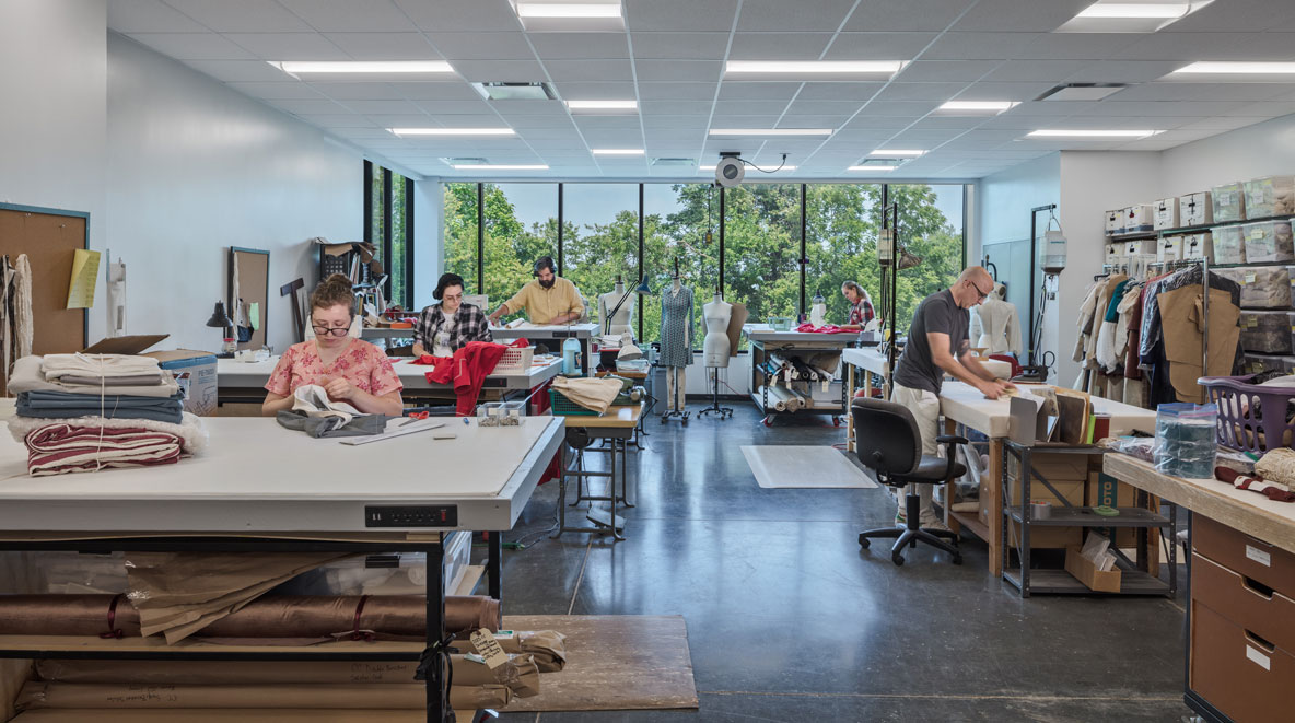 People working in the costume shop at Playhouse in the Park