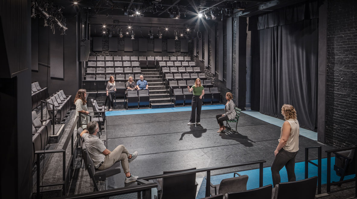 People practicing inside the shelterhouse theater at Playhouse in the Park 