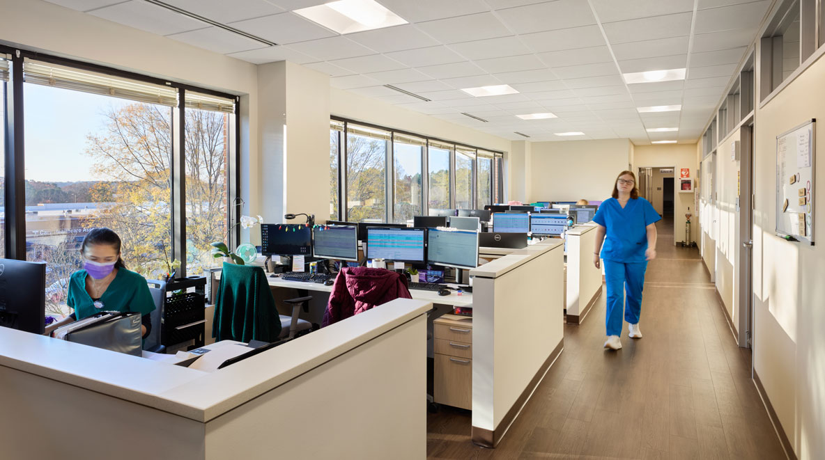 Large windows in the tech area allow natural daylight to illuminate the space.