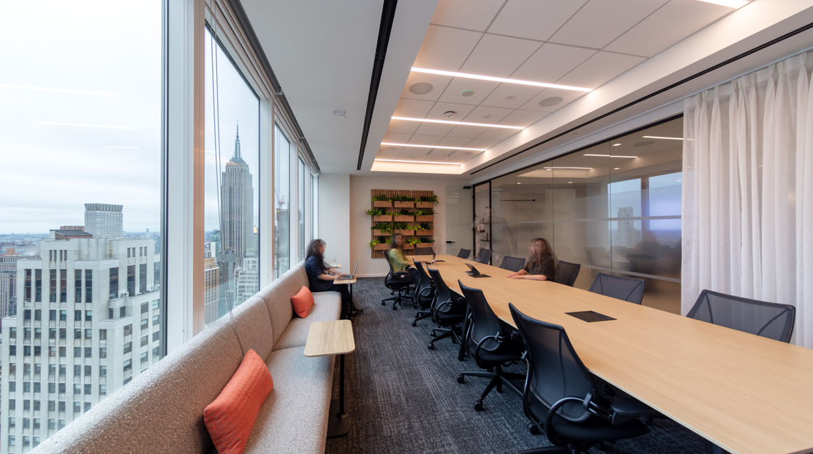 photo of the main conference room featuring the panoramic skyline