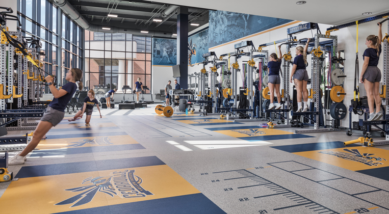 Student athletes work out together in a fitness building