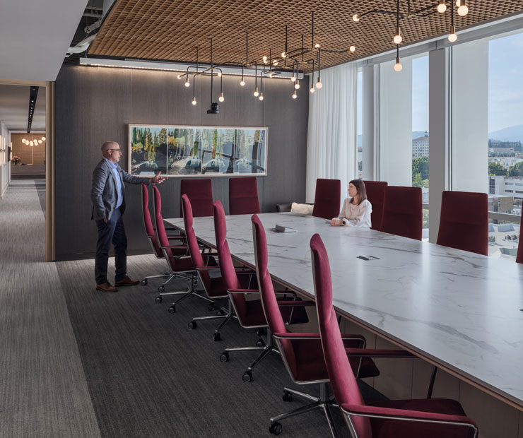 Meeting room with people talking.