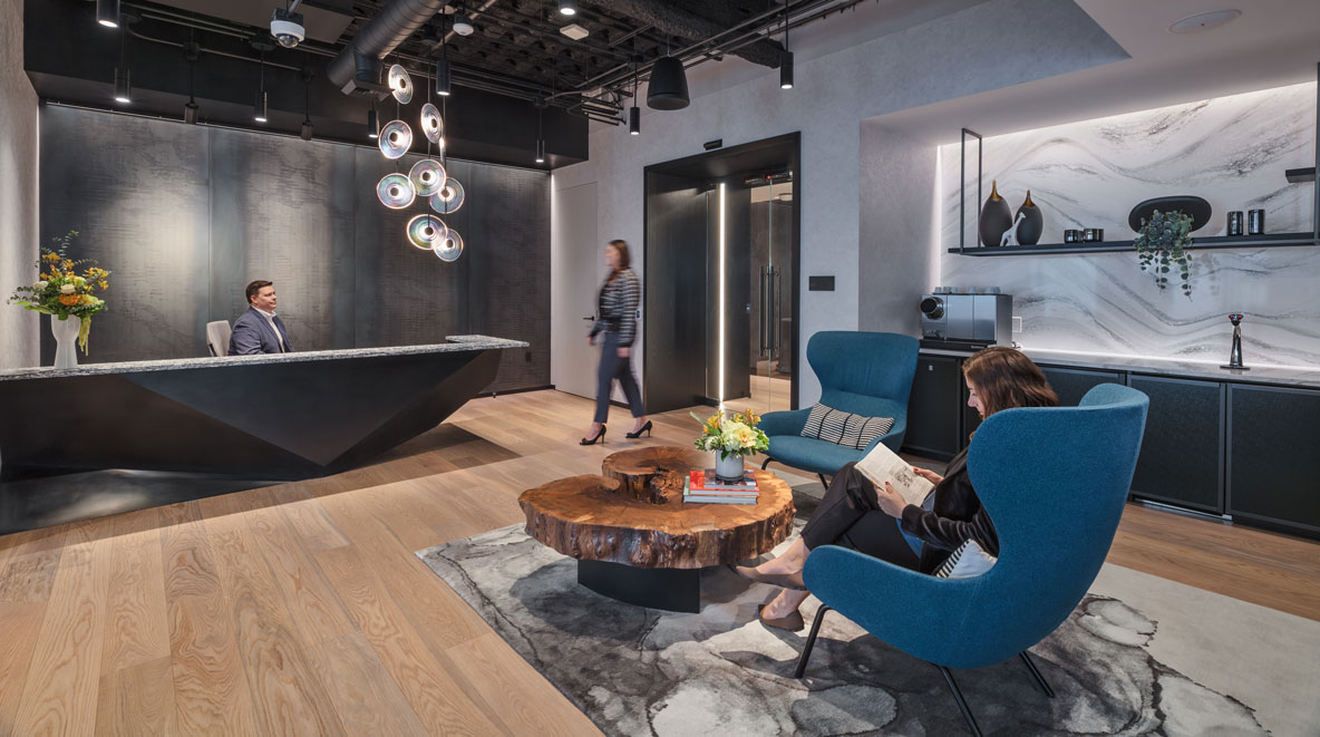 Man walking into a lobby of an office
