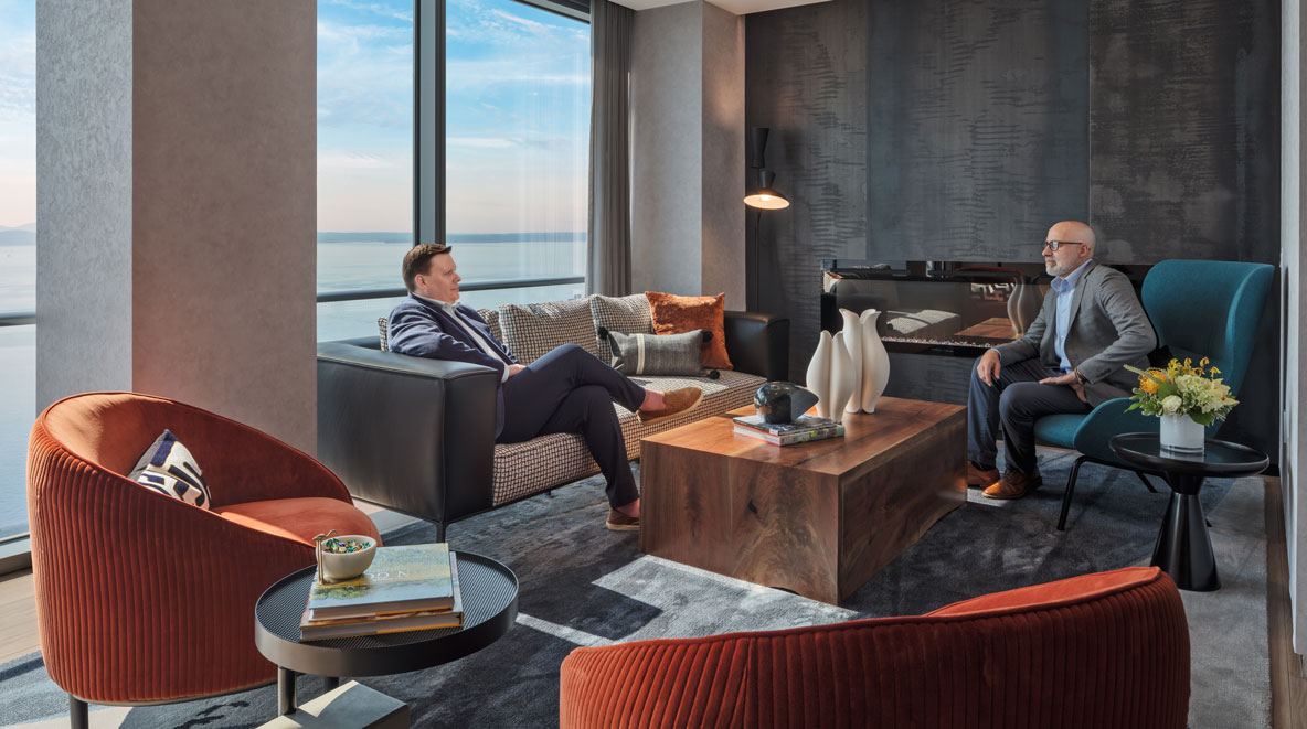 Two men sitting together