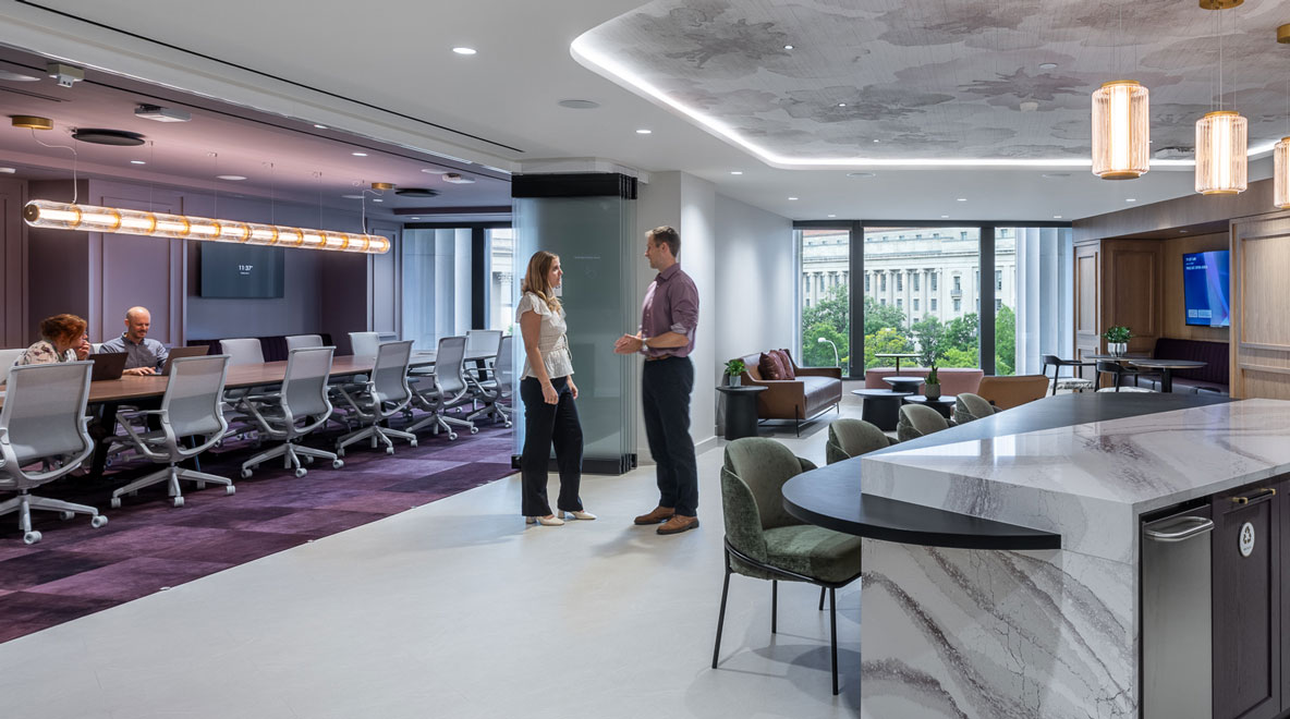 people talking near conference room and kitchen