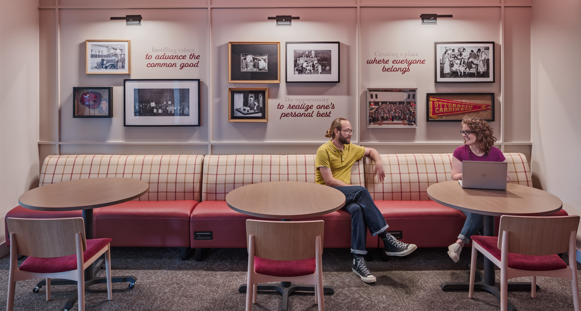 people talking at tables