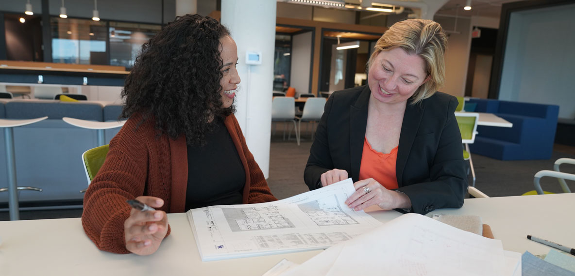 Two people going over project