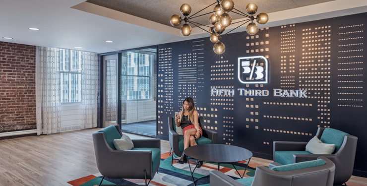 Woman in the lobby of the Fifth Third Bank Office in NYC.