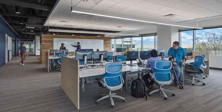 People working in office at Forcepoint in Austin, TX.