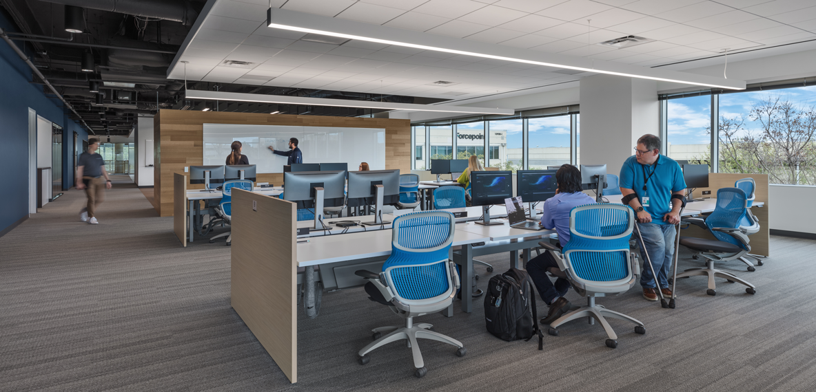 People working in office at Forcepoint in Austin, TX.