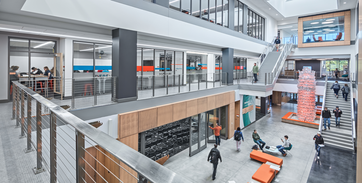 A three-story atrium, backlit-donor wall, and colorful wallcoverings set the tone for collaboration and community in Ohio Northern University’s James Lehr Kennedy Engineering Building.