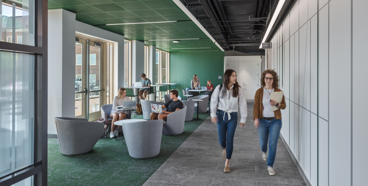 Students walking through a common area in Miami University's McVey Data Science Building