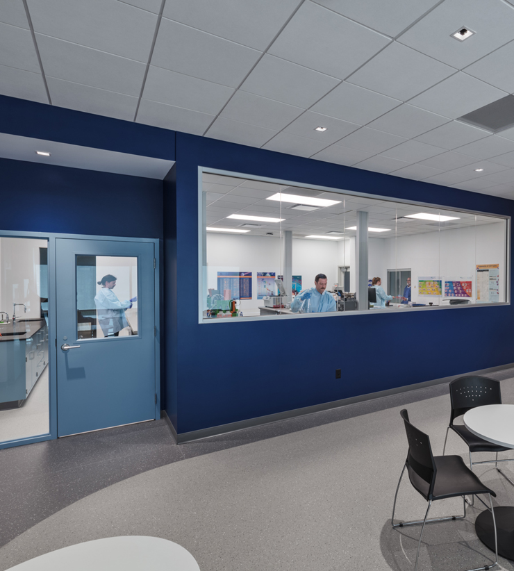 People in blood testing center, with outside waiting room