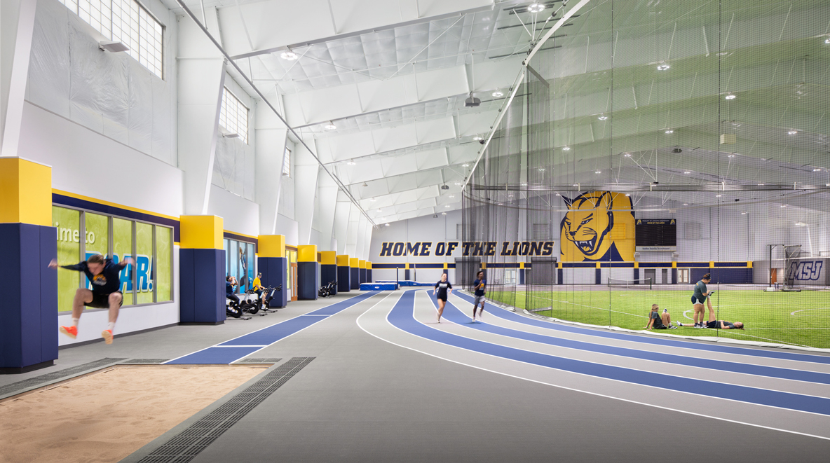 Student athletes using indoor track