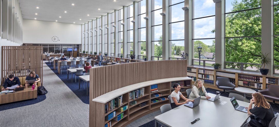 The Archbishop Alter Library at Mount St. Joseph University in Cincinnati, Ohio, provides a light-filled student learning commons experience while maintaining a rich catalogue of books.