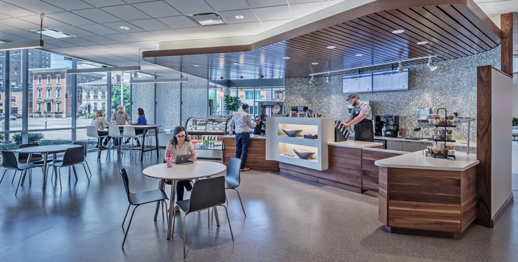 Employees grab coffee at the café inside CareSource