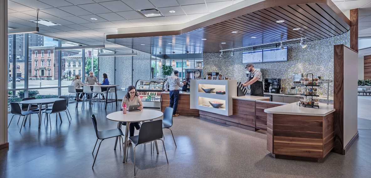 Employees grab coffee at the café inside CareSource