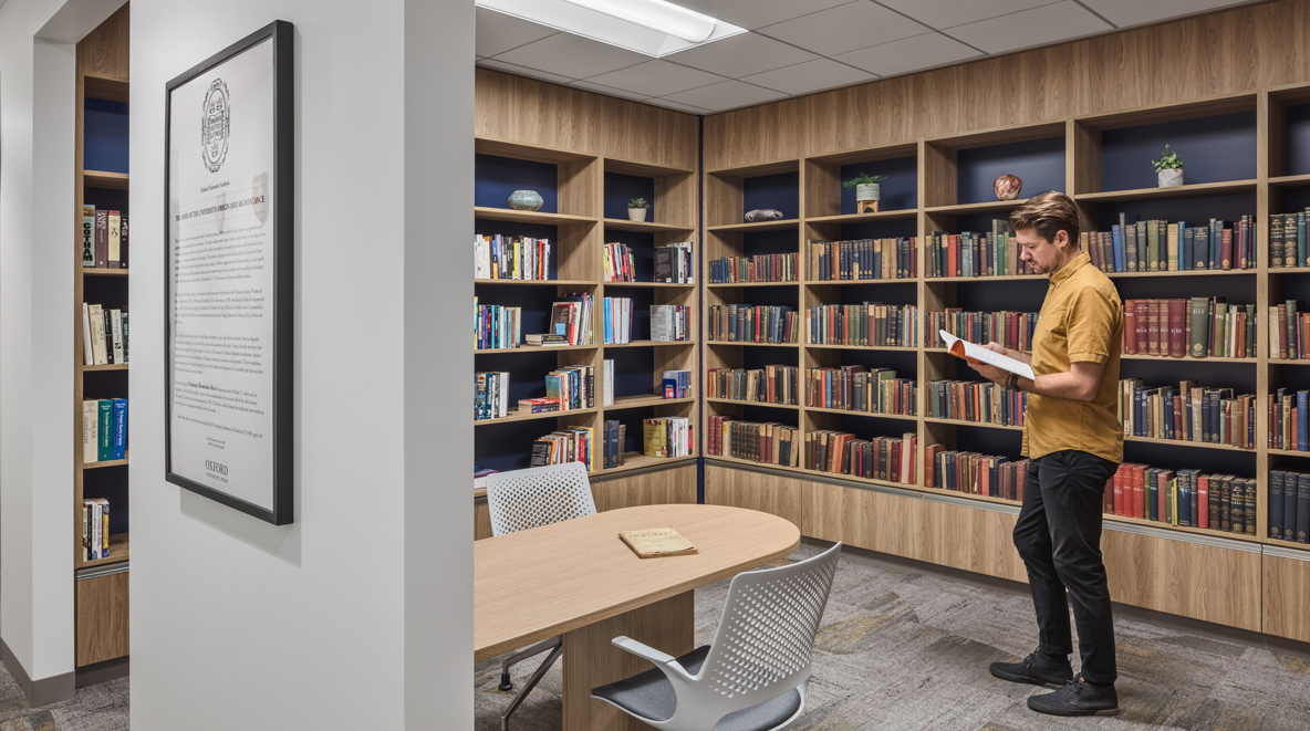An employee reads in OUP's small library