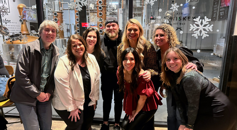 Columbus employees gather for a photo at their holiday party