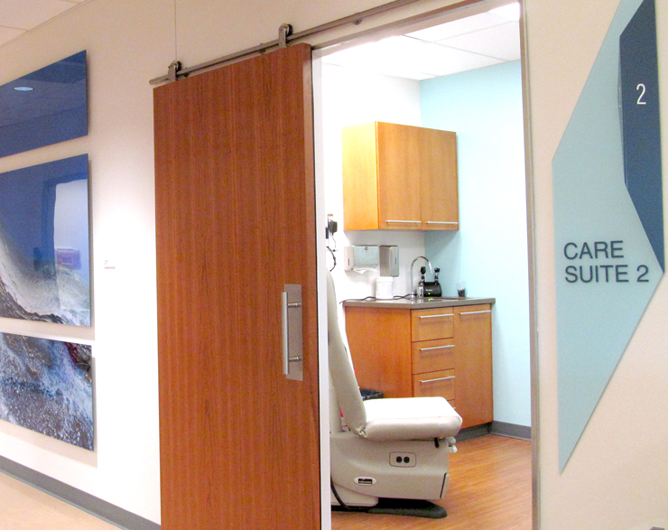 A door opens to a care suite