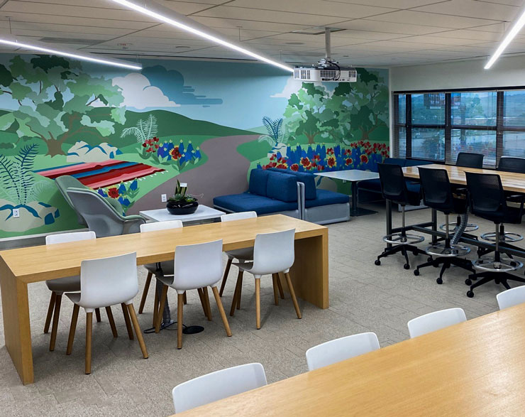 Break room with mural wall at P&G San Antonio office