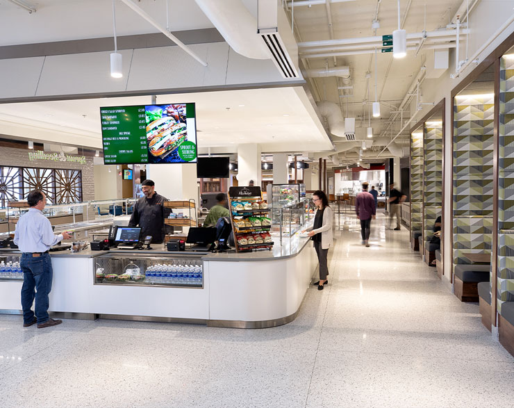 Employees grab lunch at one of the themed food stations