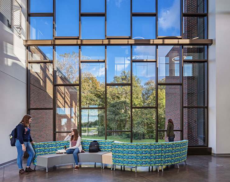 Natural light from the floor-to-ceiling windows fill the facility