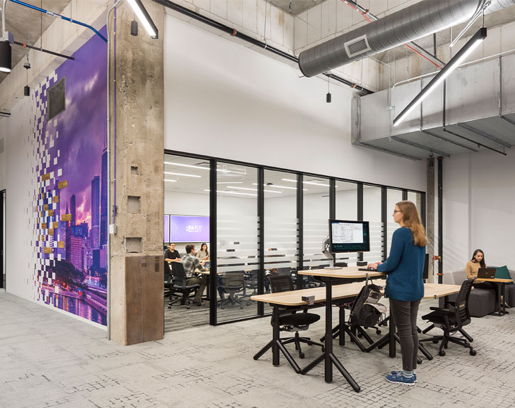 View of the large conference room and sit-to-stand desks