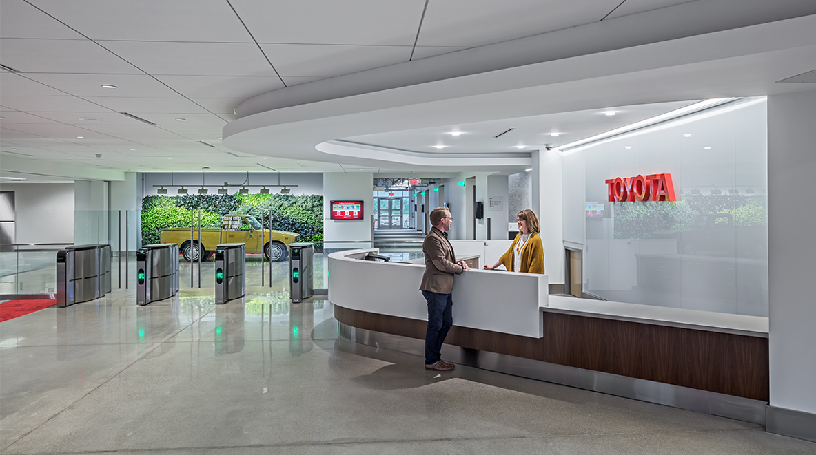 An employee stands in the lobby at Toyota York