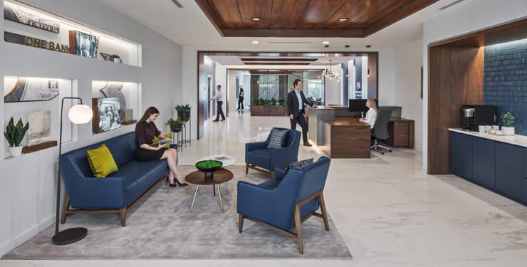 Employees gather in a seating area near the entrance of Fifth Third Montgomery Wealth