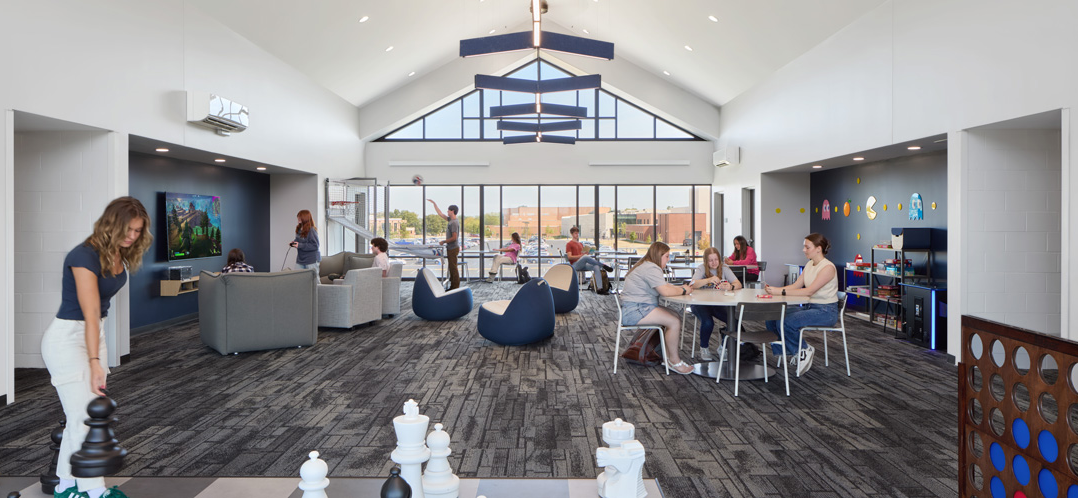 A social lounge in Cedarville University’s newly constructed residence hall fosters a cohesive community and sense of social connection for students.