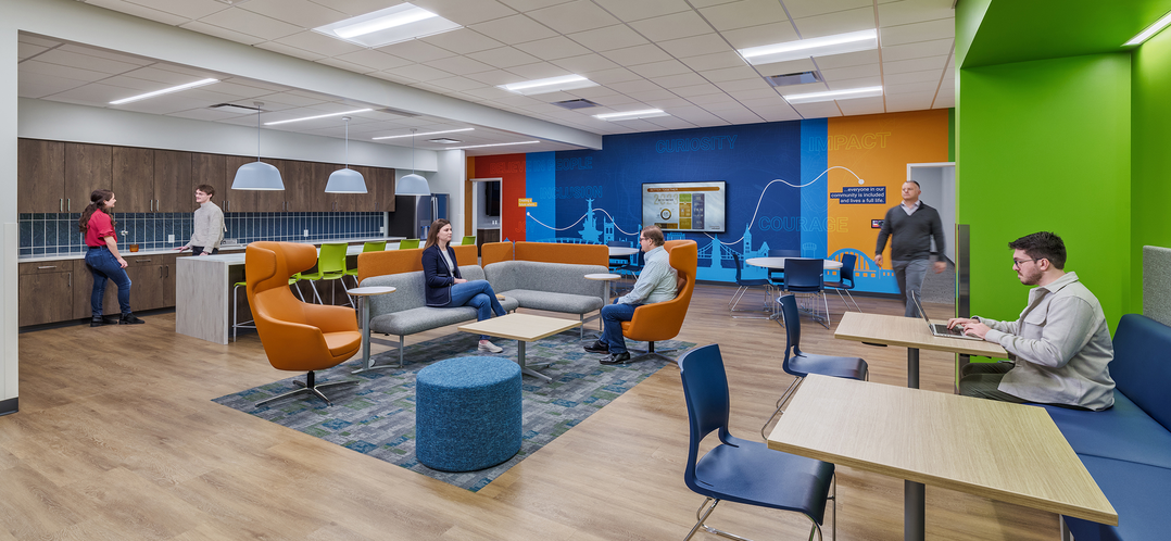 image of a kitchen and break room area with flexible seating options