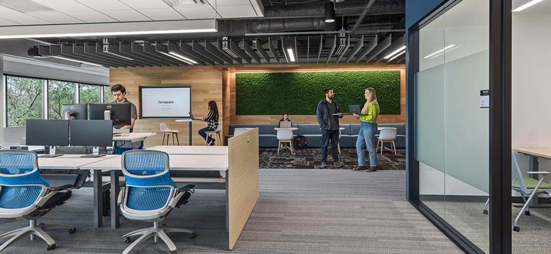 image of office space with desks, conference rooms, and coworking areas